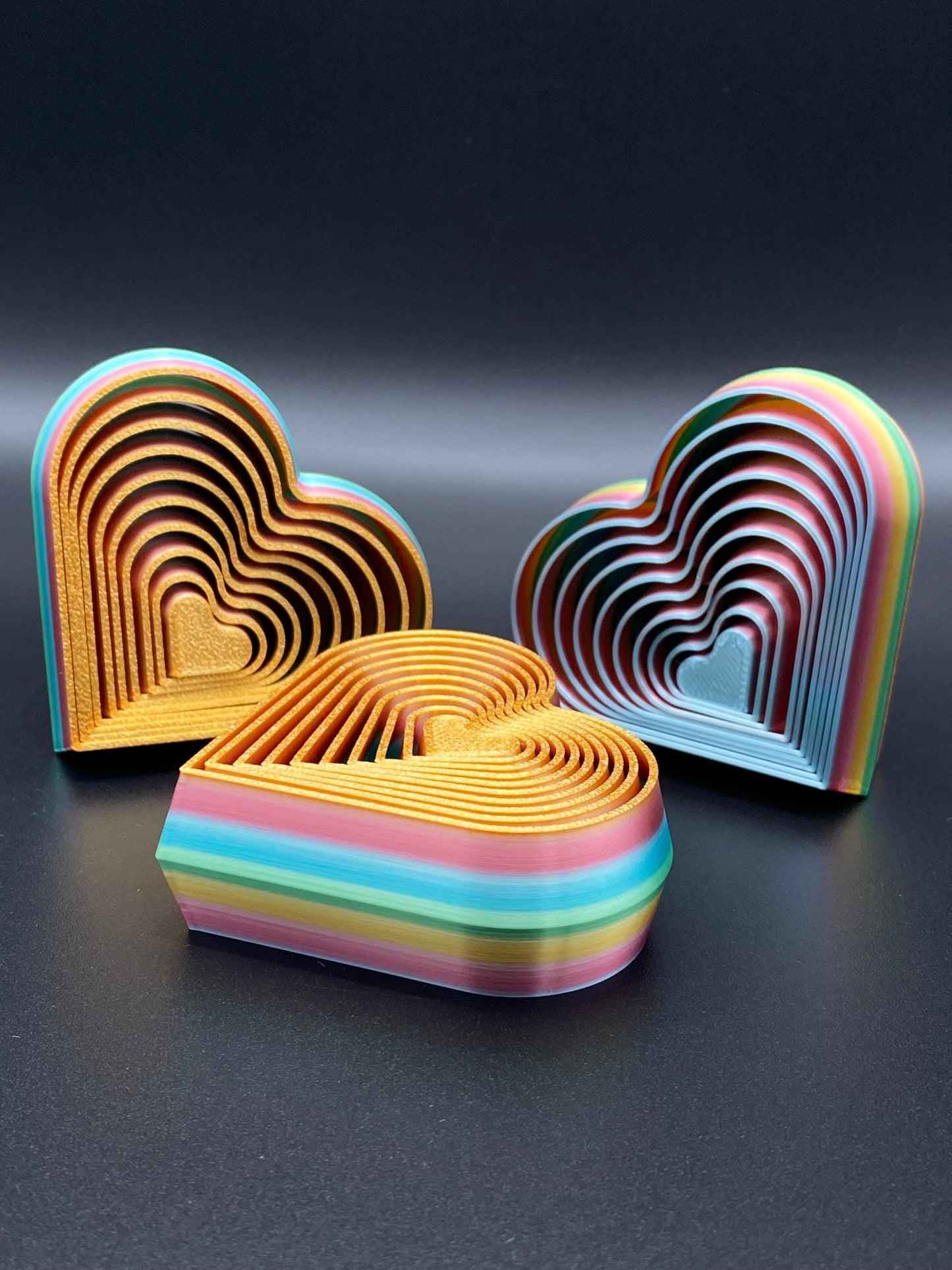 Layered rainbow heart fidget